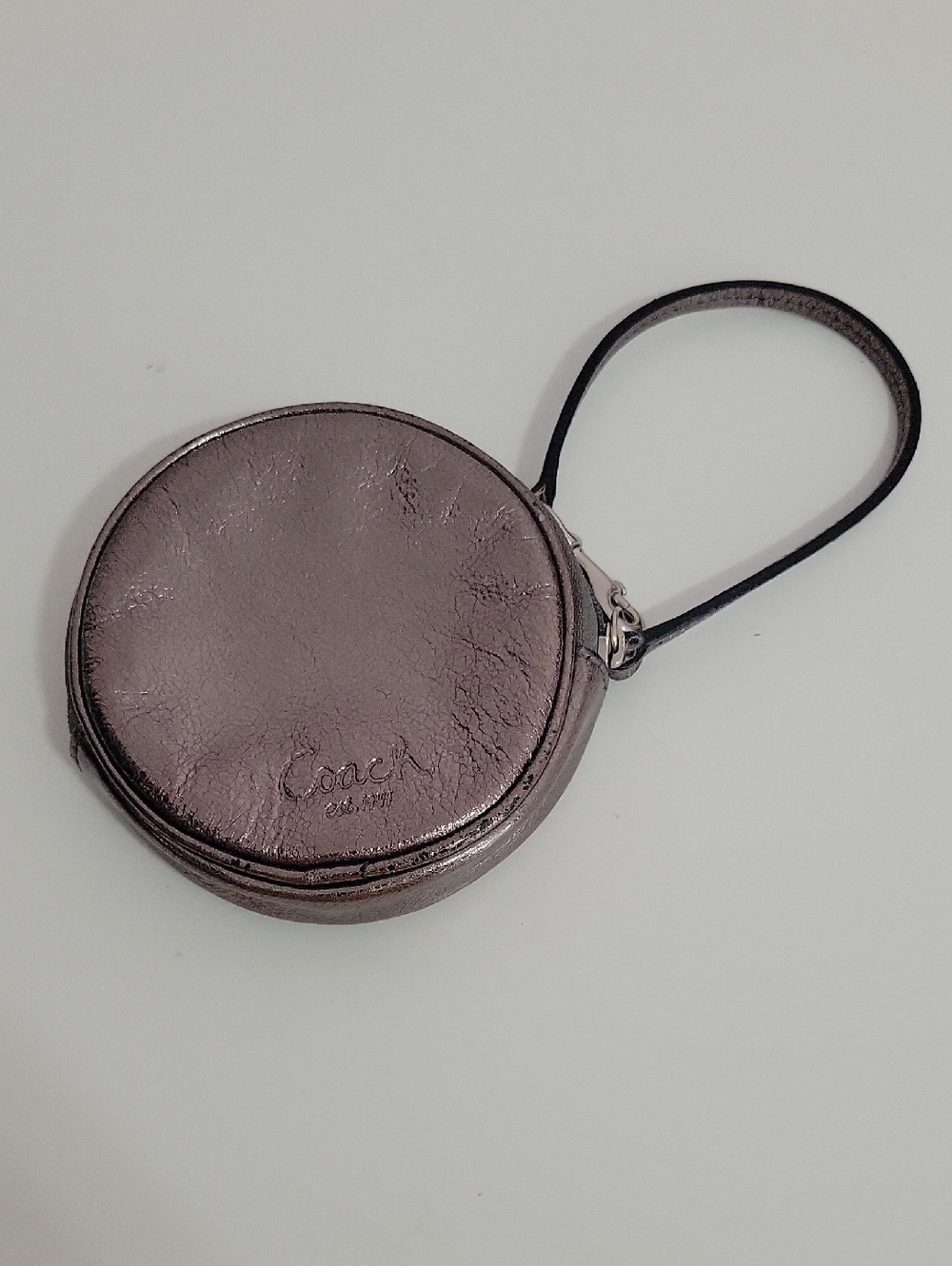 Coach Metallic Mauve Round Wristlet